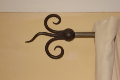 Flared curtain pole