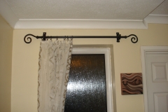 Curvy curtain pole