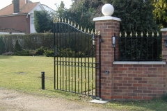Spiked driveway gate